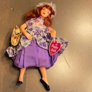 Happy Dolls made in England vintage doll. This doll shows no sign of damage.